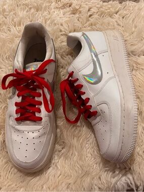 Nike White Sneakers with Holographic Tongue and Red Laces